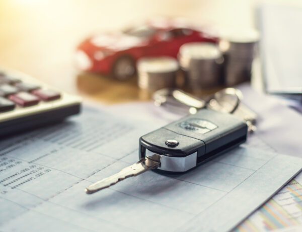 image of car key and financial statement